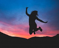 Happ person jumping because wecare taking new patients